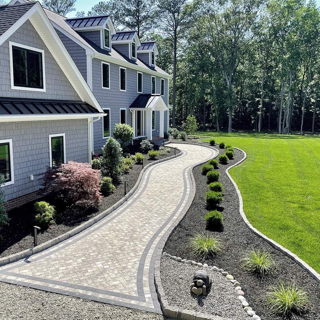 Paver walkway and planting bed by GOAT Hardscape in Framingham, MA