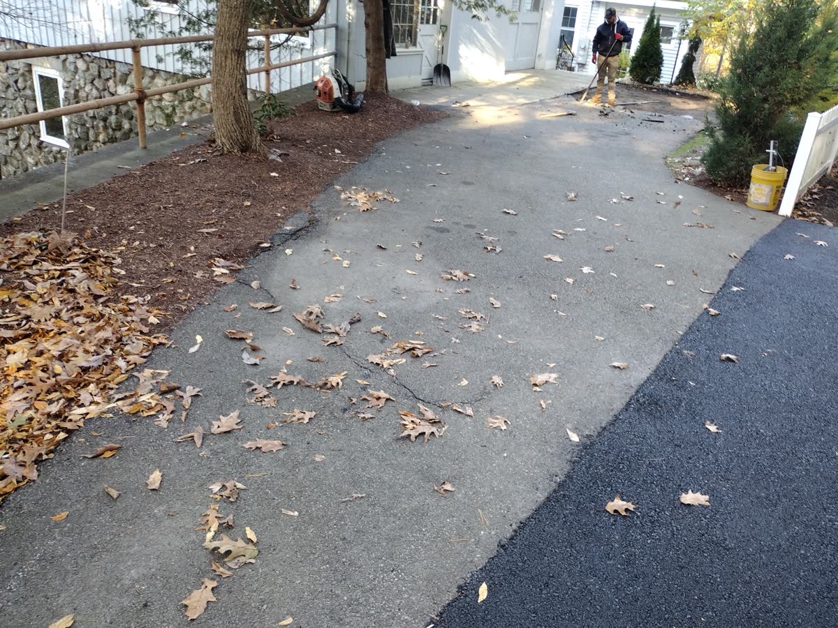 Leaves cleared from the beds and driveway during a fall cleanup